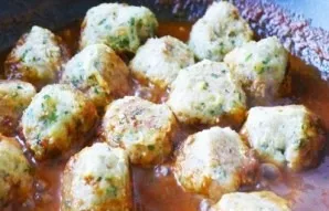 We take the cutlets out of the refrigerator and put them in the sauce. Simmer over low heat after covering for 5 minutes. Turn them over ...