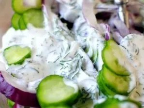 Mix vegetables with ready-made sour cream sauce.
