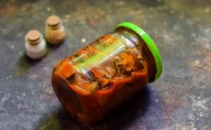 Roll up the jars with sterile lids and turn them upside down, cover with a blanket and leave for a day, then put in the pantry.