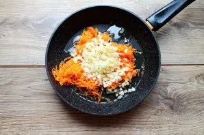 Cut celery into small cubes and put in a pan with vegetables.
