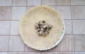 Put a spoonful of filling on each pancake.