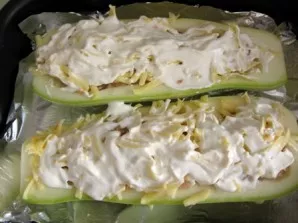 Lightly grease the top with sour cream (if desired, you can squeeze 1-2 cloves of garlic through a press) to form an attractive crust. Pl...