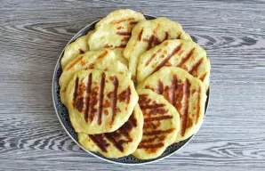 Put the prepared pancakes on a plate and serve warm.
