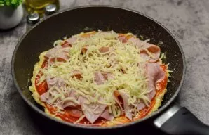 Sprinkle everything with grated cheese on top. Bake covered for 5-7 minutes over low heat.