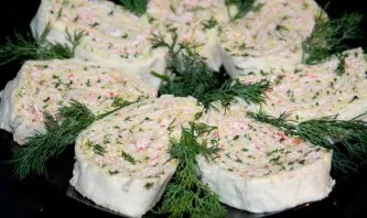 Cut the roll into portions before serving. Enjoy your meal!