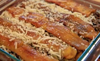 Now in a separate bowl, mix the eggs and milk and pour this mixture into a container.