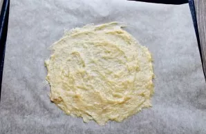 Preheat oven to 200 degrees. Put one tablespoon of dough on baking paper and spread a circle in a thin layer, a little more than the desi...