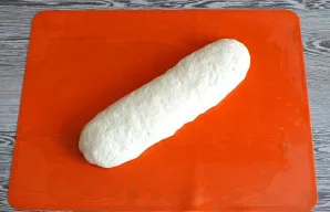 Turn over and compare the shape of when a nice straight loaf would be.