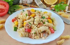 Salad with chicken and pasta is ready. You can serve immediately. Delicious!