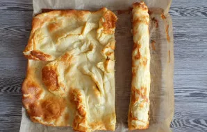 Roll up the roll. The pancake wraps very well, does not break when warm. Cut into desired pieces. The remaining pancake can be spread wit...