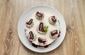 Then remove the film ring, decorate as you wish and serve.