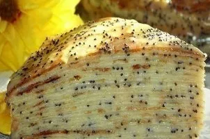 Pancake cake with cream and poppy seeds