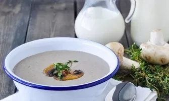 Mushroom creamy soup with champignons and cream