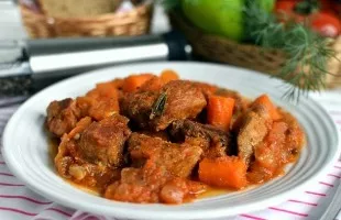 Meat stewed in a saucepan